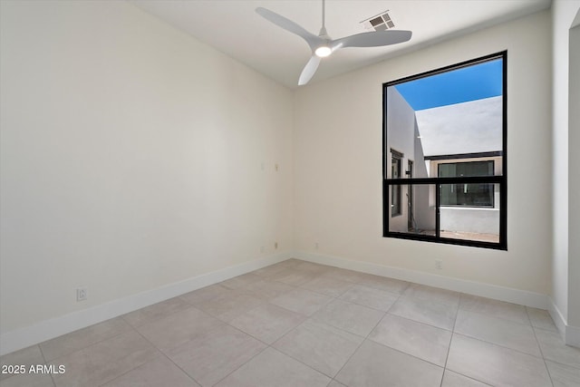 29215 N 136th St, Scottsdale, AZ 85262 - empty room featuring baseboards, ceiling fan, and tile patterned floors