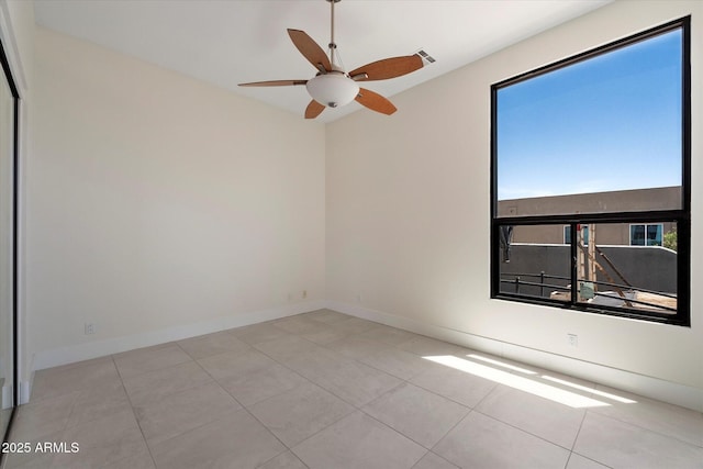 29215 N 136th St, Scottsdale, AZ 85262 - spare room featuring ceiling fan and tile patterned flooring