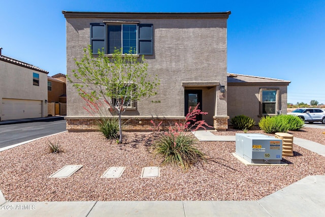 8208 W Albeniz Pl, Phoenix, AZ 85043 - view of front of house featuring stucco siding