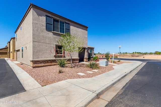 8208 W Albeniz Pl, Phoenix, AZ 85043 - view of front facade with stucco siding