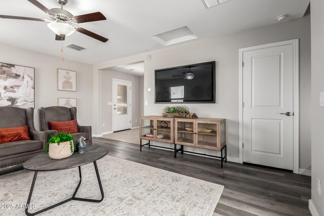 8208 W Albeniz Pl, Phoenix, AZ 85043 - living room featuring attic access, wood finished floors, a ceiling fan, and baseboards