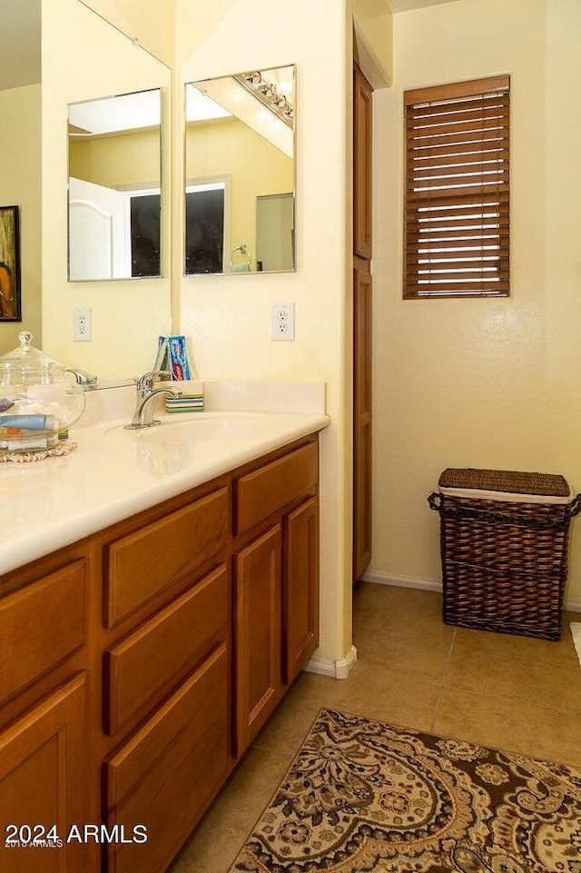 bathroom featuring vanity and tile patterned floors