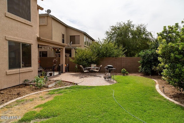 view of yard with a patio area