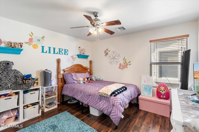 bedroom featuring dark wood-type flooring and ceiling fan