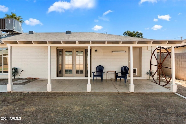 back of house with a patio area