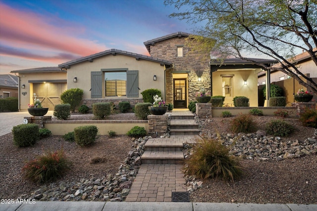 view of front of home with a garage