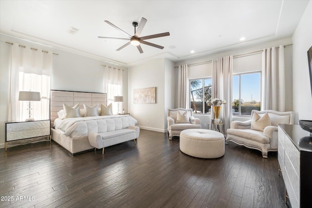 bedroom with ceiling fan and dark hardwood / wood-style flooring