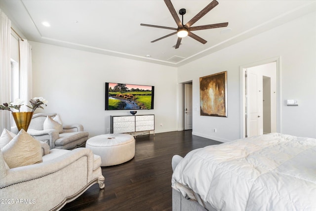 bedroom featuring dark hardwood / wood-style floors and ceiling fan