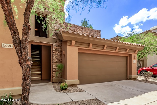 view of front of house with a garage