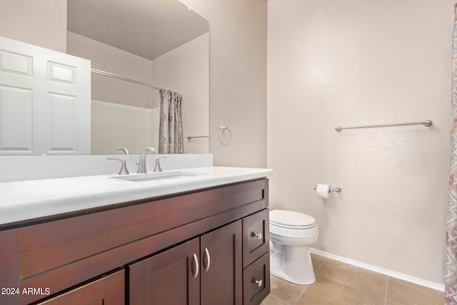 bathroom with tile patterned flooring, vanity, toilet, and a shower with shower curtain