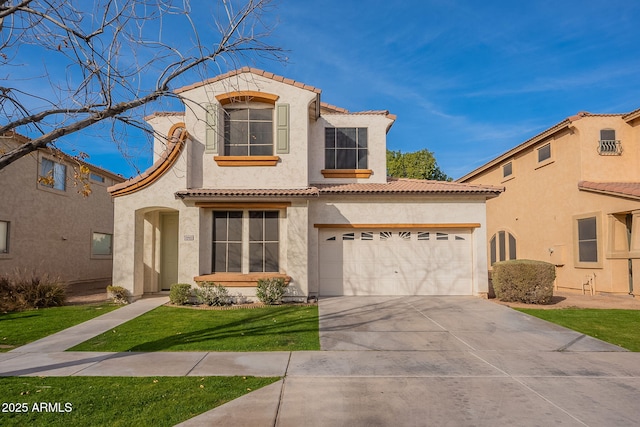 mediterranean / spanish house with a garage and a front lawn