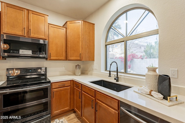 kitchen with stainless steel appliances and sink