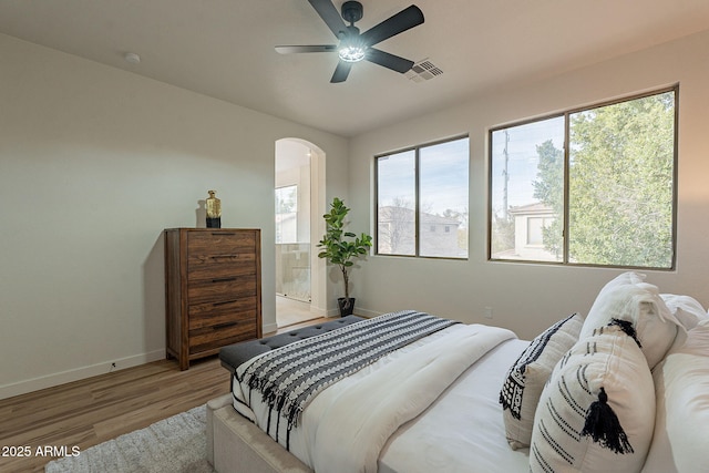 bedroom featuring ceiling fan and wood-type flooring