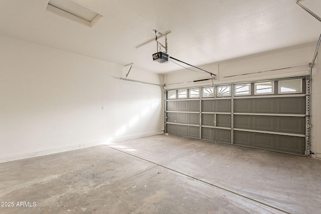 garage featuring a garage door opener