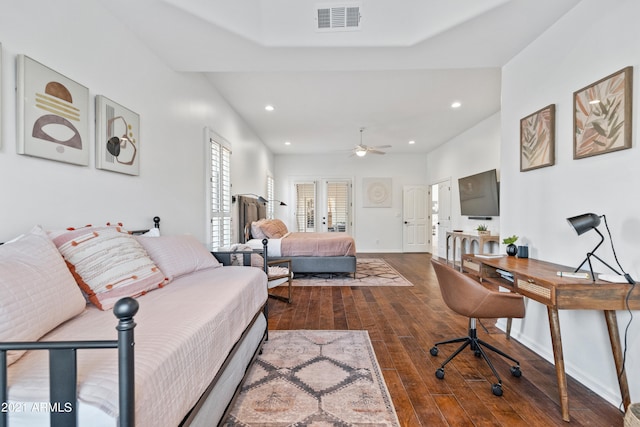 bedroom featuring wood-type flooring and french doors