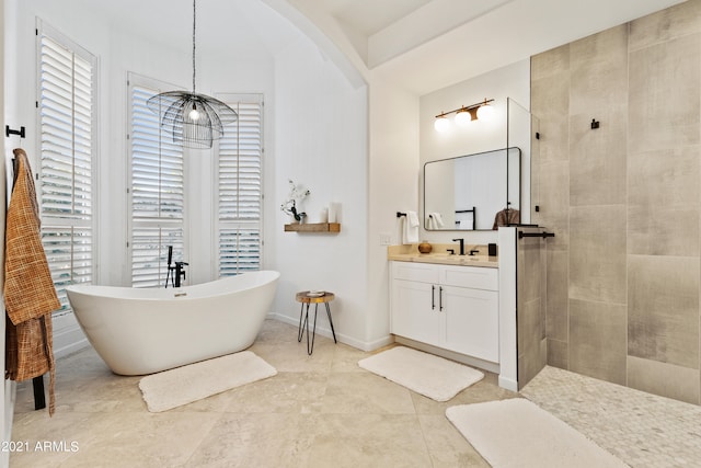 bathroom with separate shower and tub, tile patterned floors, and vanity