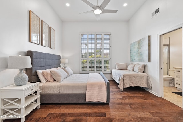 bedroom featuring ensuite bathroom, ceiling fan, and dark hardwood / wood-style floors