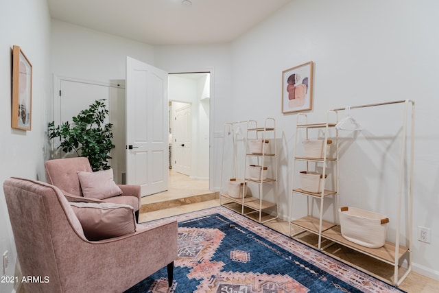 sitting room with tile patterned floors