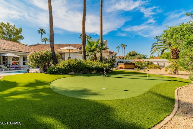 surrounding community featuring a pool and a patio