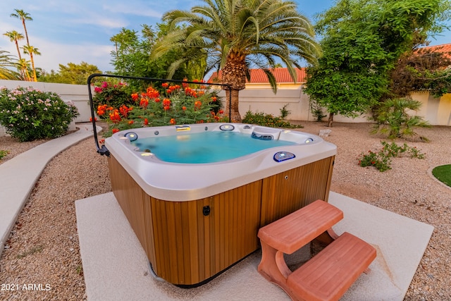 exterior space featuring a hot tub