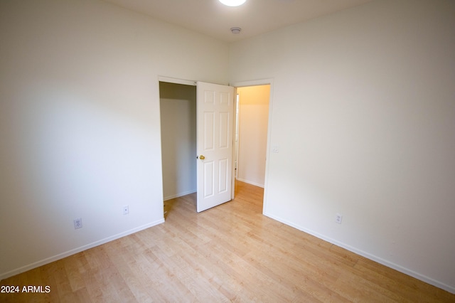 unfurnished room featuring light hardwood / wood-style floors