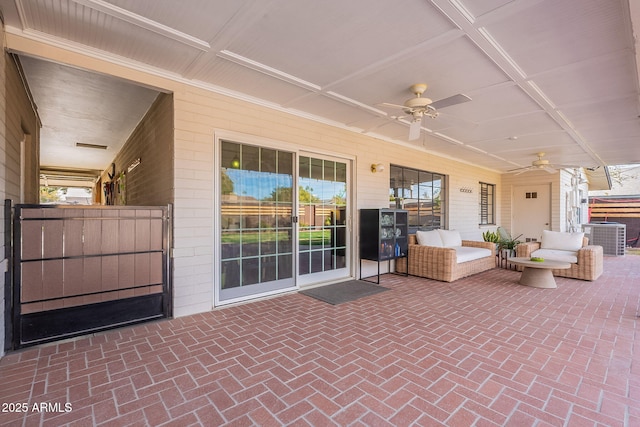 view of patio / terrace featuring central AC, outdoor lounge area, and ceiling fan