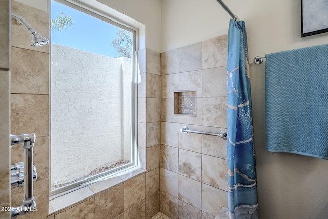 bathroom with curtained shower