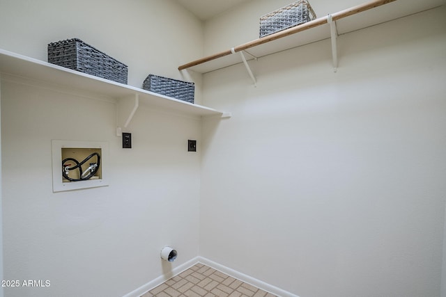 laundry room with hookup for a washing machine and hookup for an electric dryer