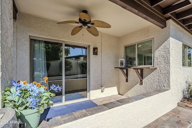 view of patio / terrace featuring ceiling fan