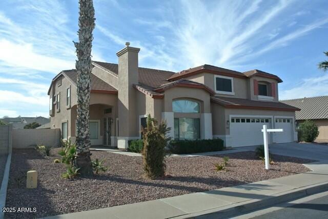 3145 W Sandra Ter, Phoenix, AZ 85053 - view of front of property with a garage