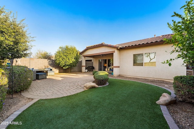 view of yard with ceiling fan, a patio, and fence