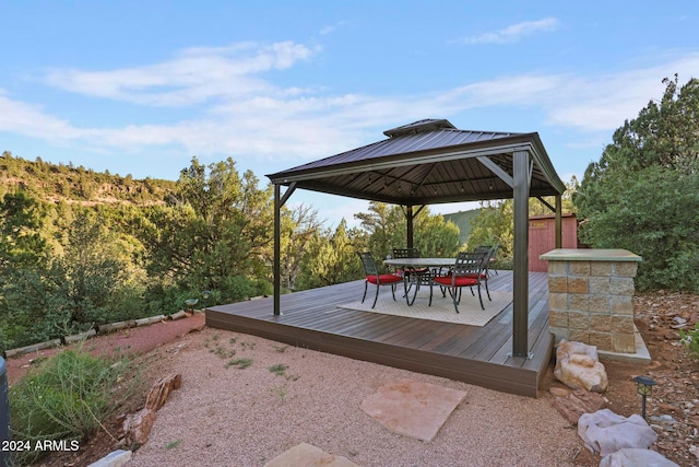 wooden deck with a gazebo