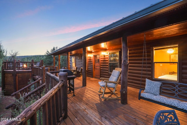 view of deck at dusk