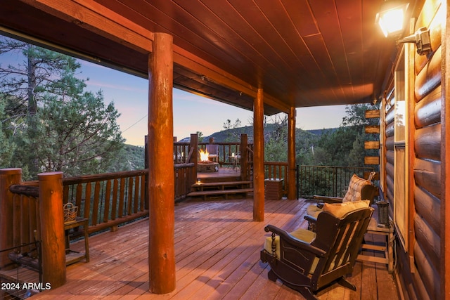 view of deck at dusk