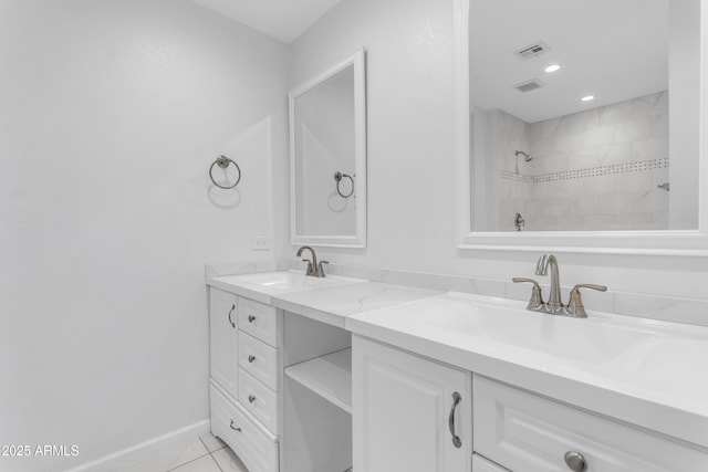 4200 N Miller Rd Unit 112, Scottsdale, AZ 85251 - full bath featuring double vanity, a tile shower, and baseboards
