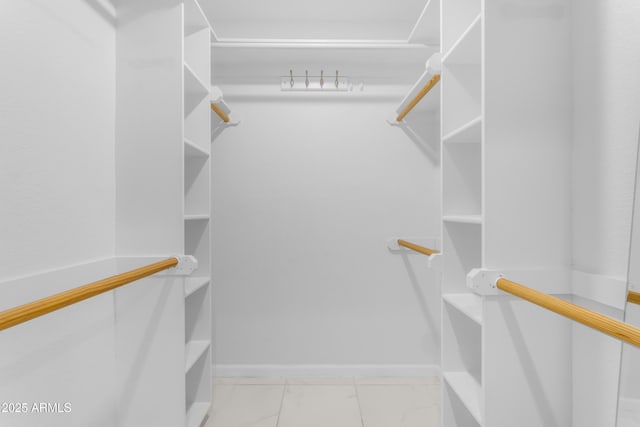 4200 N Miller Rd Unit 112, Scottsdale, AZ 85251 - walk in closet with marble finish floors