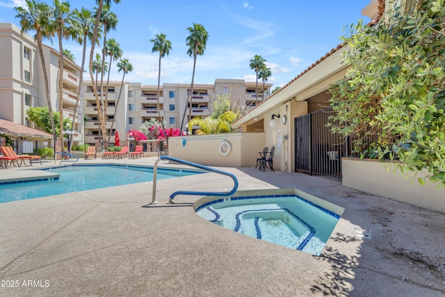 4200 N Miller Rd Unit 112, Scottsdale, AZ 85251 - community pool featuring a community hot tub, a patio, and fence