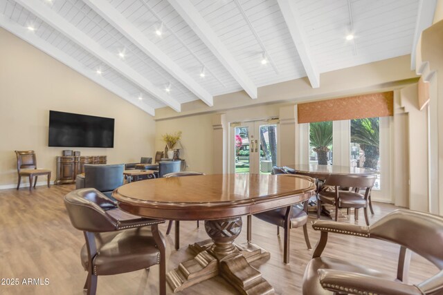 4200 N Miller Rd Unit 112, Scottsdale, AZ 85251 - dining space with french doors, wood finished floors, wood ceiling, and baseboards