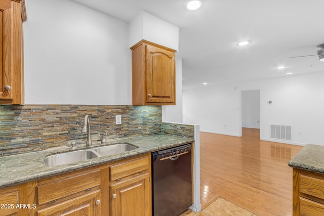 4200 N Miller Rd Unit 112, Scottsdale, AZ 85251 - kitchen with dishwasher, a sink, decorative backsplash, stone countertops, and recessed lighting