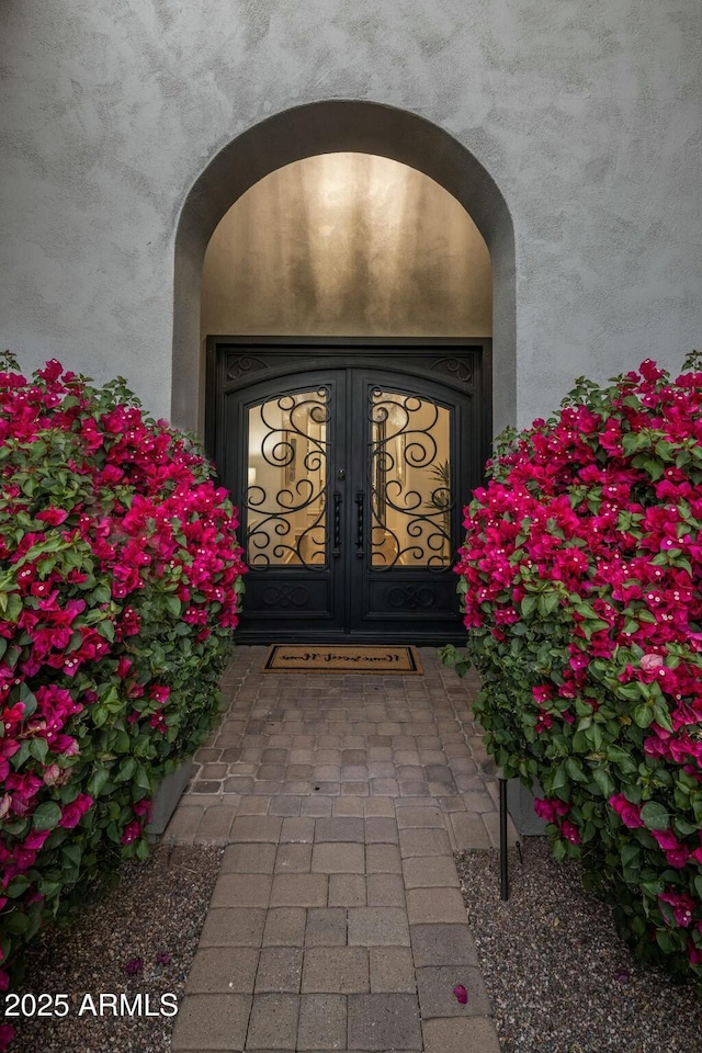 property entrance with french doors