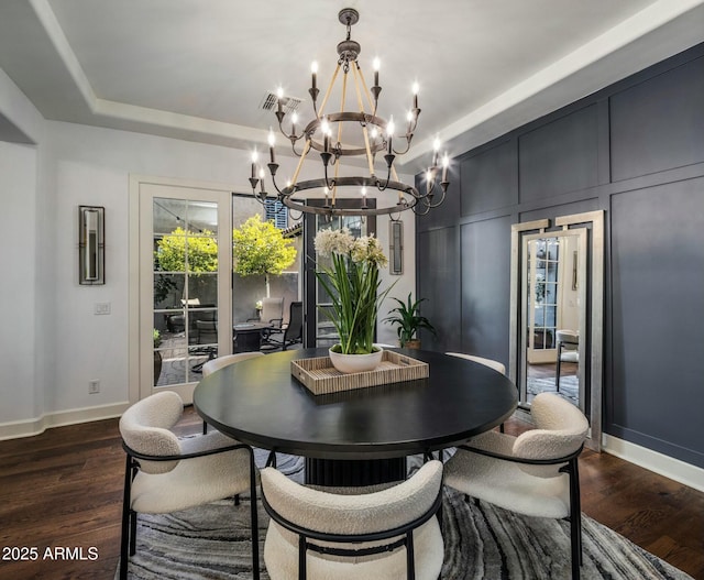 dining area featuring dark hardwood / wood-style floors