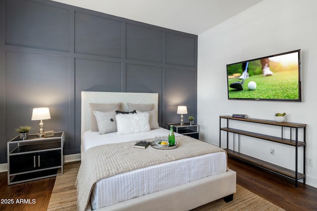 bedroom featuring dark wood-type flooring