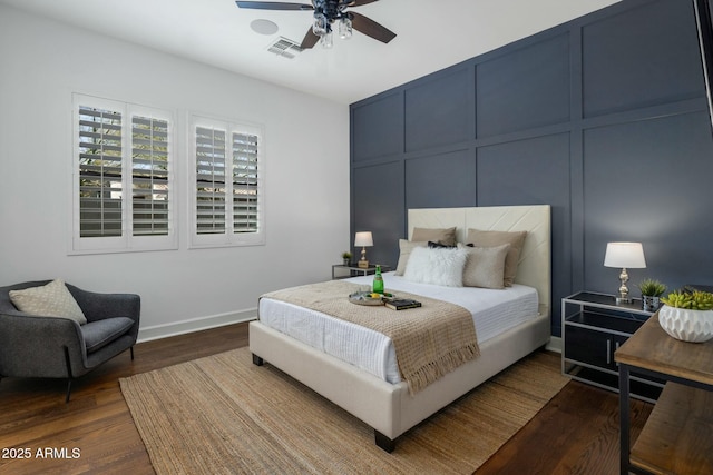 bedroom featuring wood-type flooring and ceiling fan