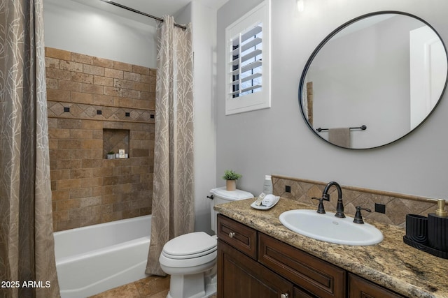 full bathroom featuring vanity, shower / bath combination with curtain, tile patterned floors, and toilet