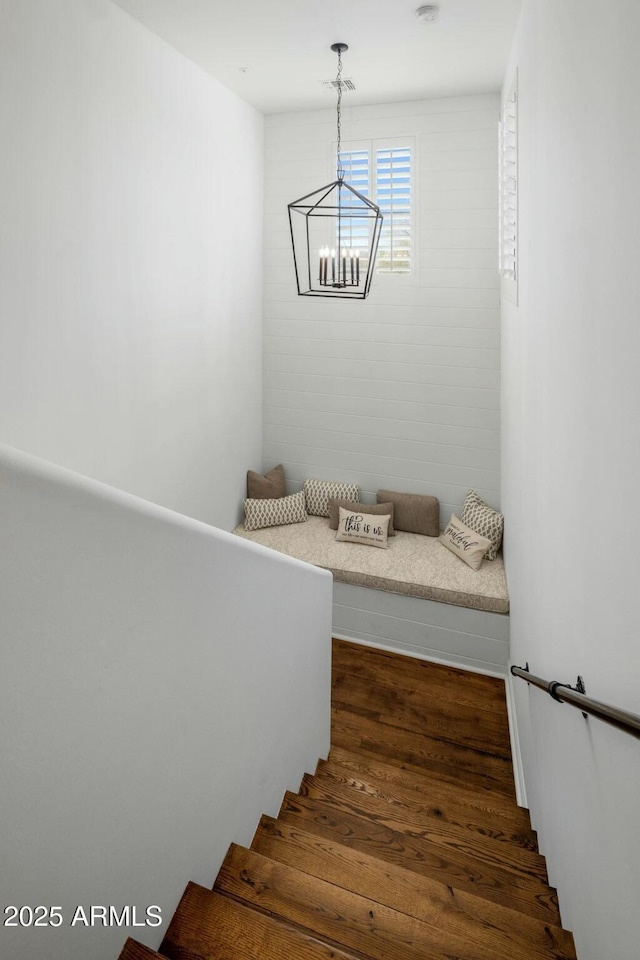 staircase featuring hardwood / wood-style floors