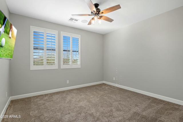 unfurnished room featuring carpet floors and ceiling fan