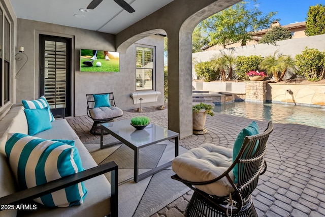 view of patio with a pool with hot tub, an outdoor hangout area, and ceiling fan