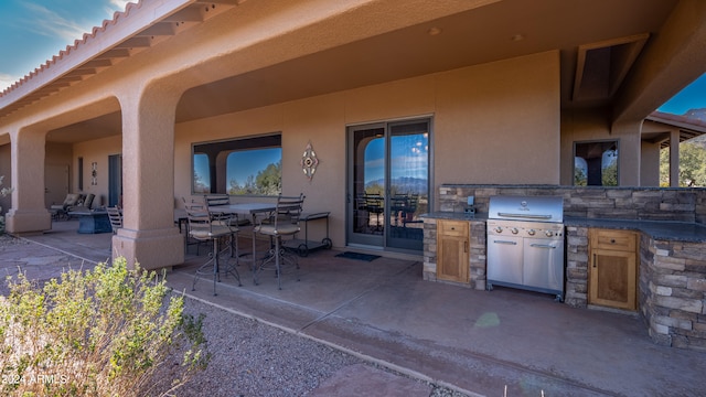 view of patio featuring area for grilling and grilling area