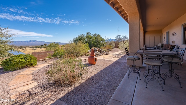 view of patio with a mountain view