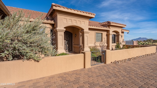 mediterranean / spanish-style home featuring a mountain view